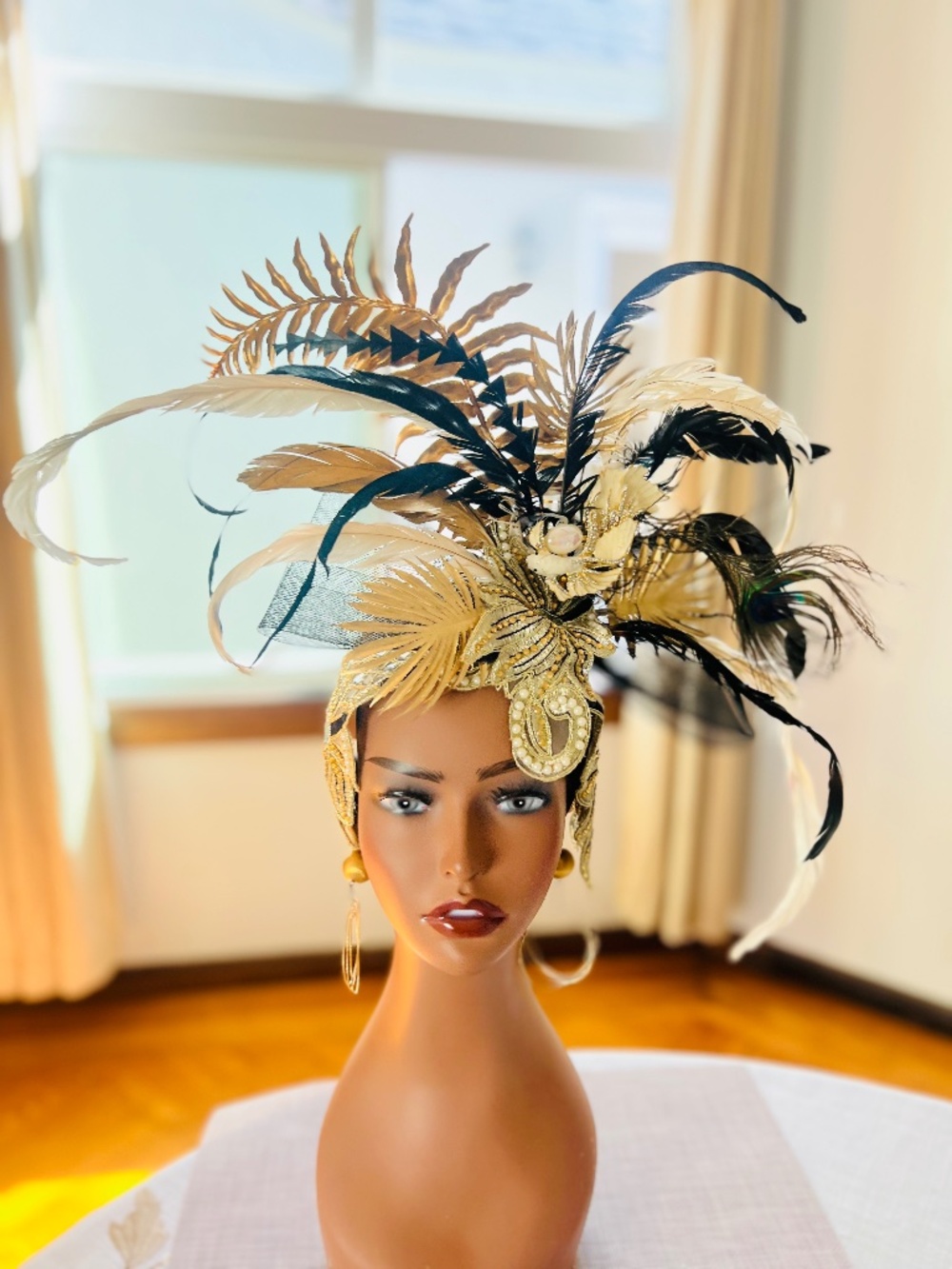 Avant--garde black, gold and ivory feathers on embroidered mirrored band